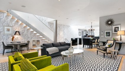 Living room with green sofa